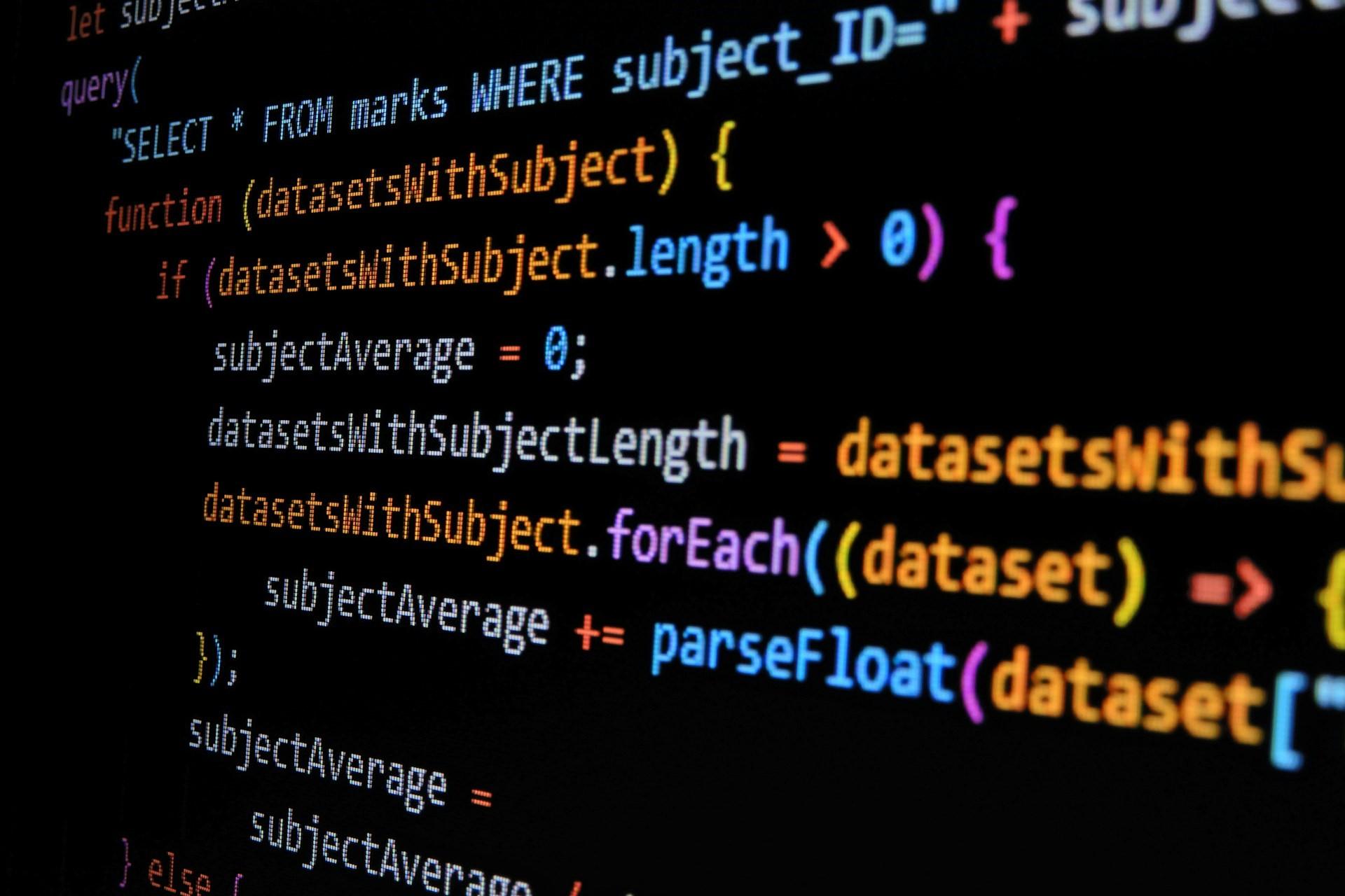 A closeup of computer code on a black screen.