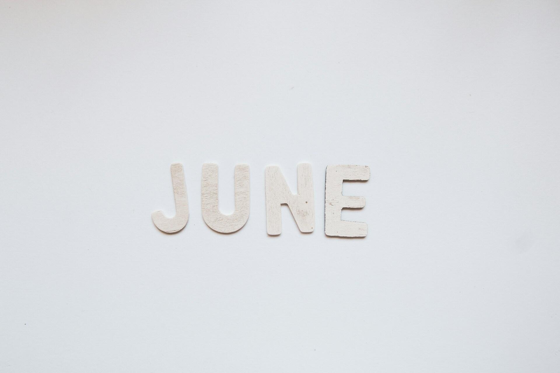 A cutout of the letters spelling "June"