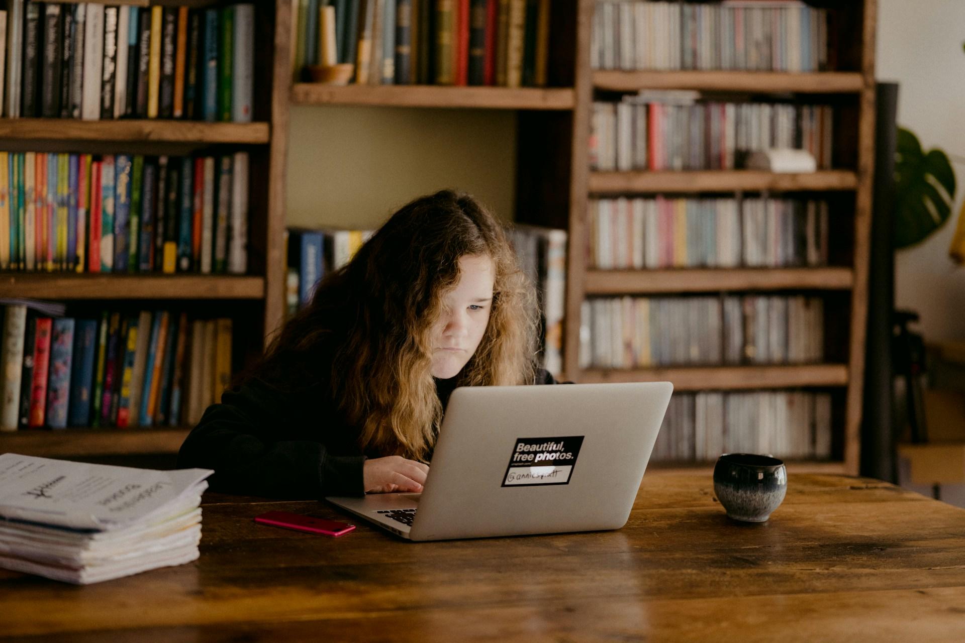 A student studying at her laptop.