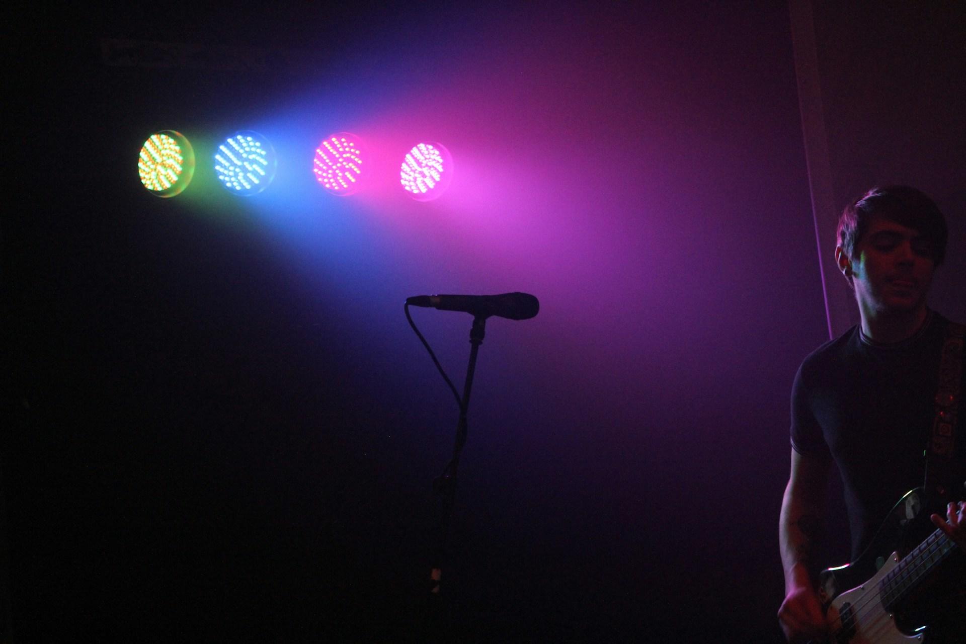 A guitarist on stage.