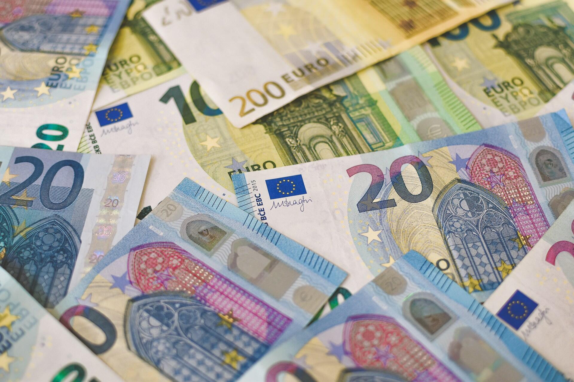 Assorted euro banknotes spread out and overlapping