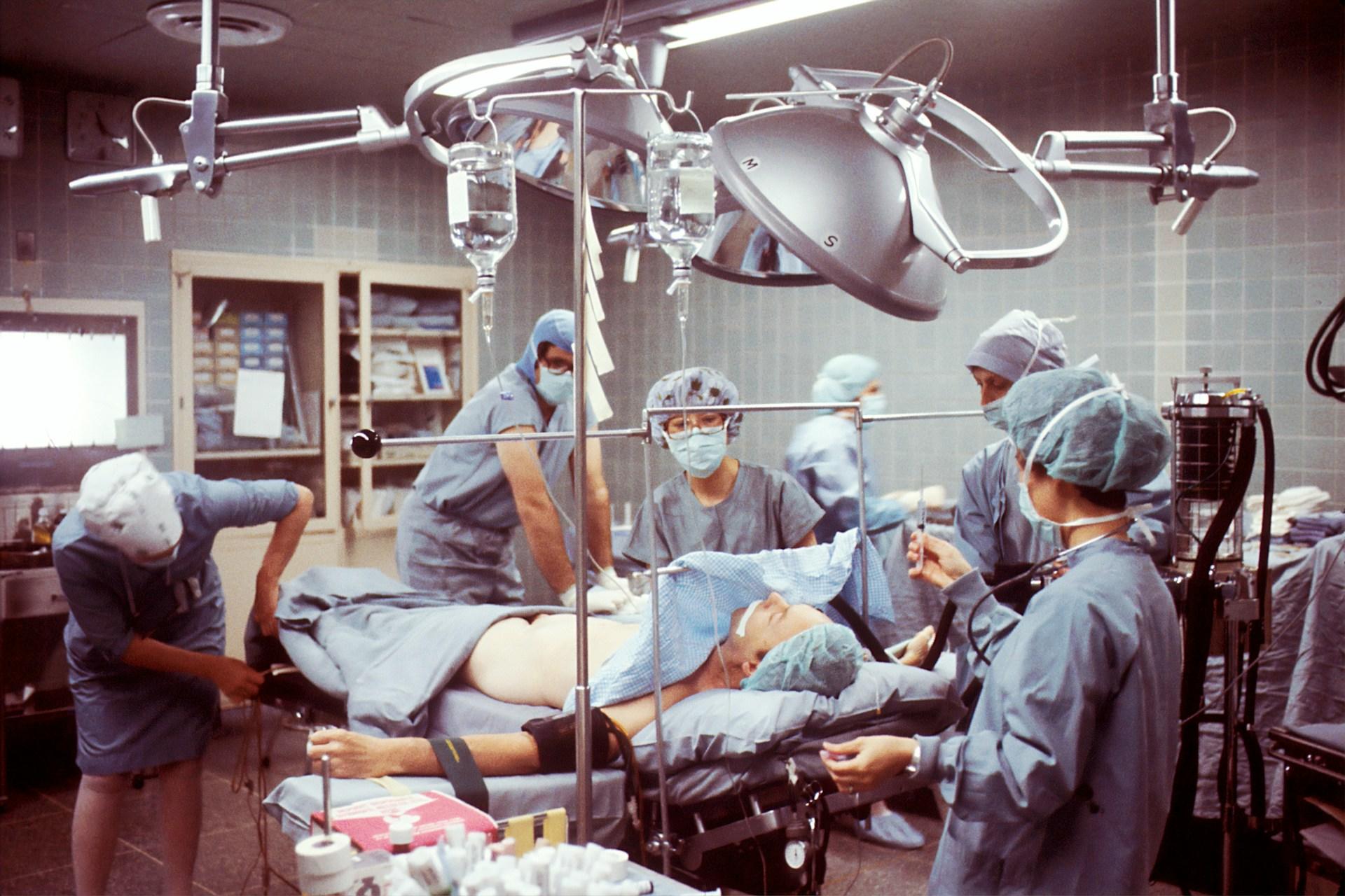 Surgeons in an operating theatre.