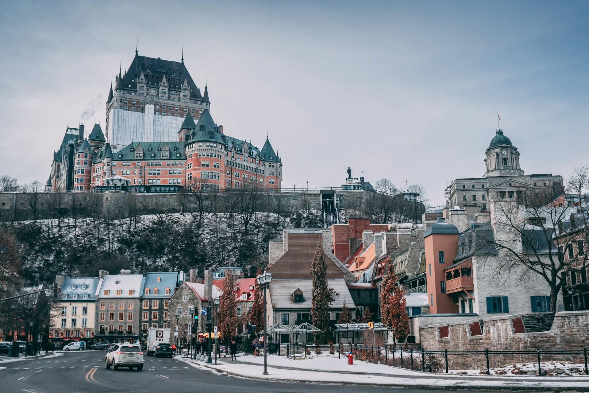 Snowy street in Quebec City with Château Frontenac on a hill