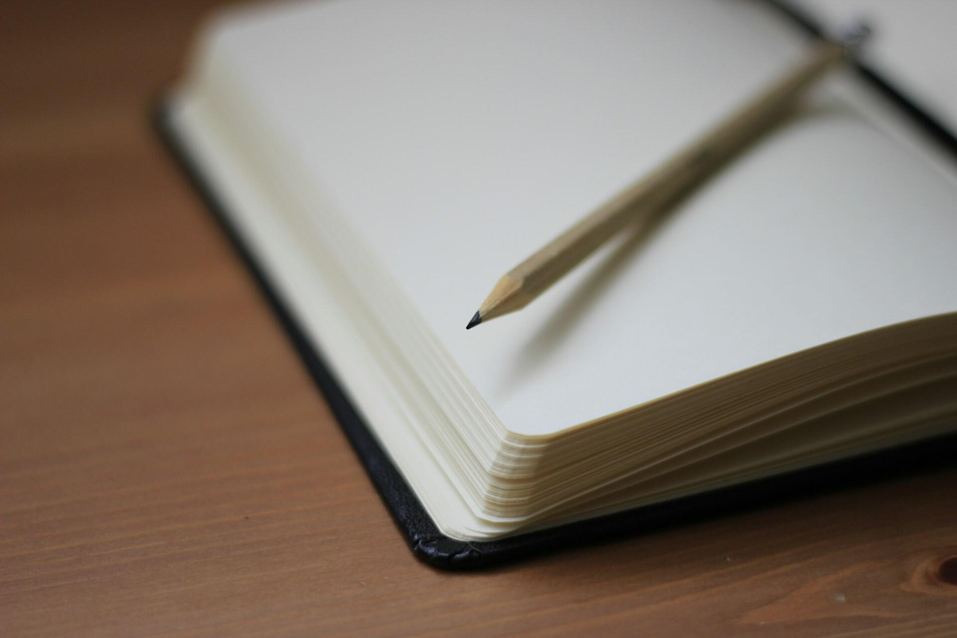 A blank notepad with a pencil.