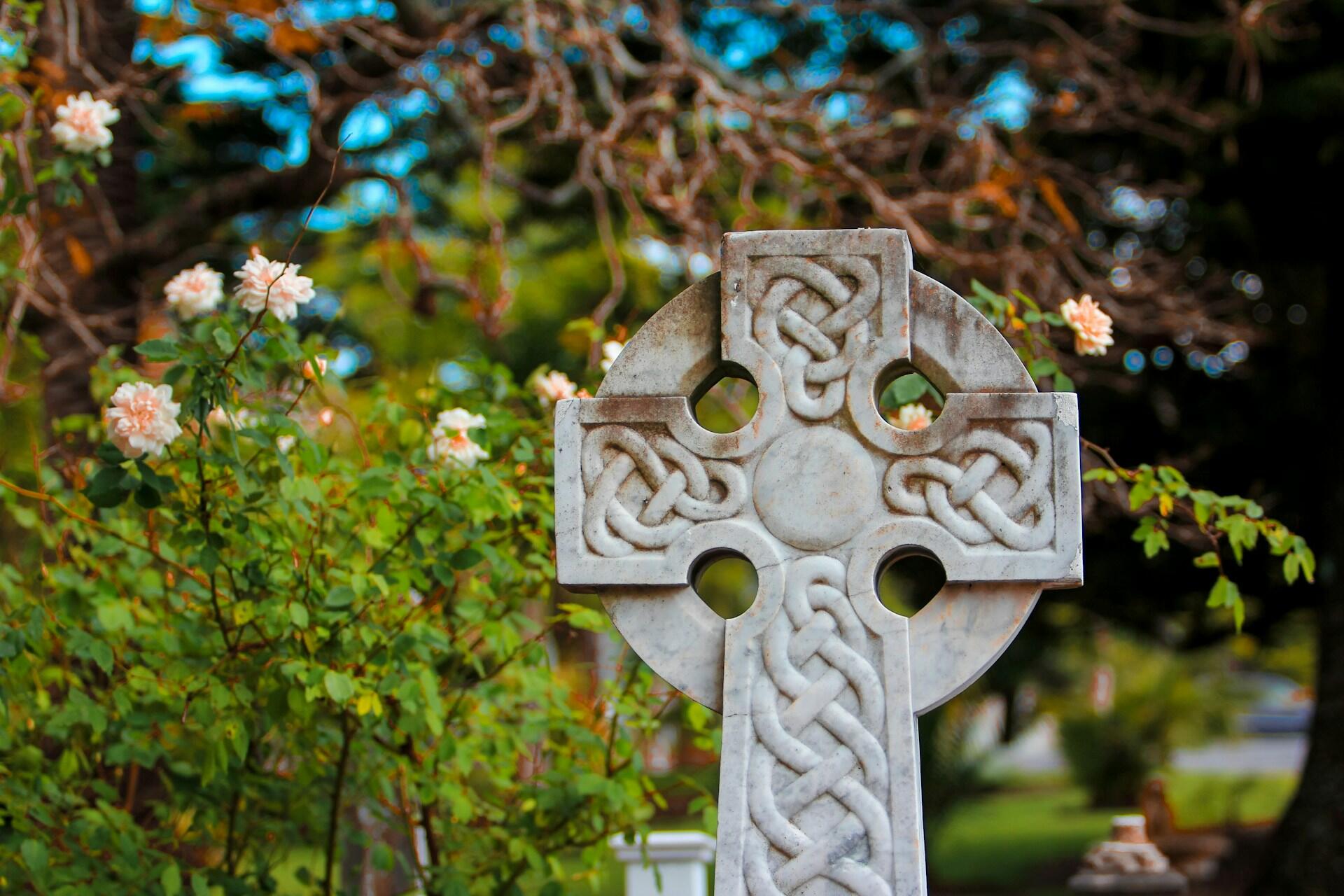 A Celtic Cross in a graveyard.