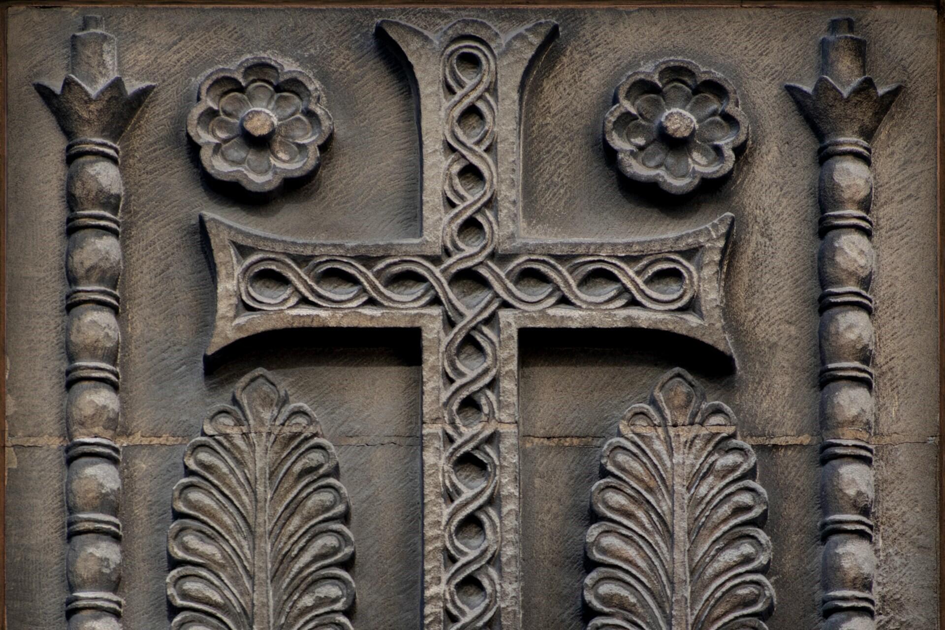 A cross with Irish carvings.