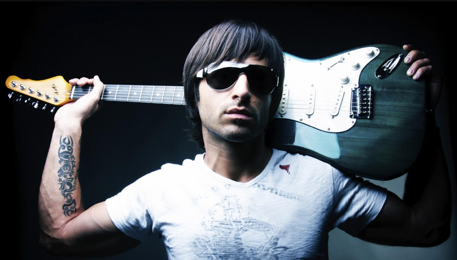 Try to become a rockstar by playing the guitar.