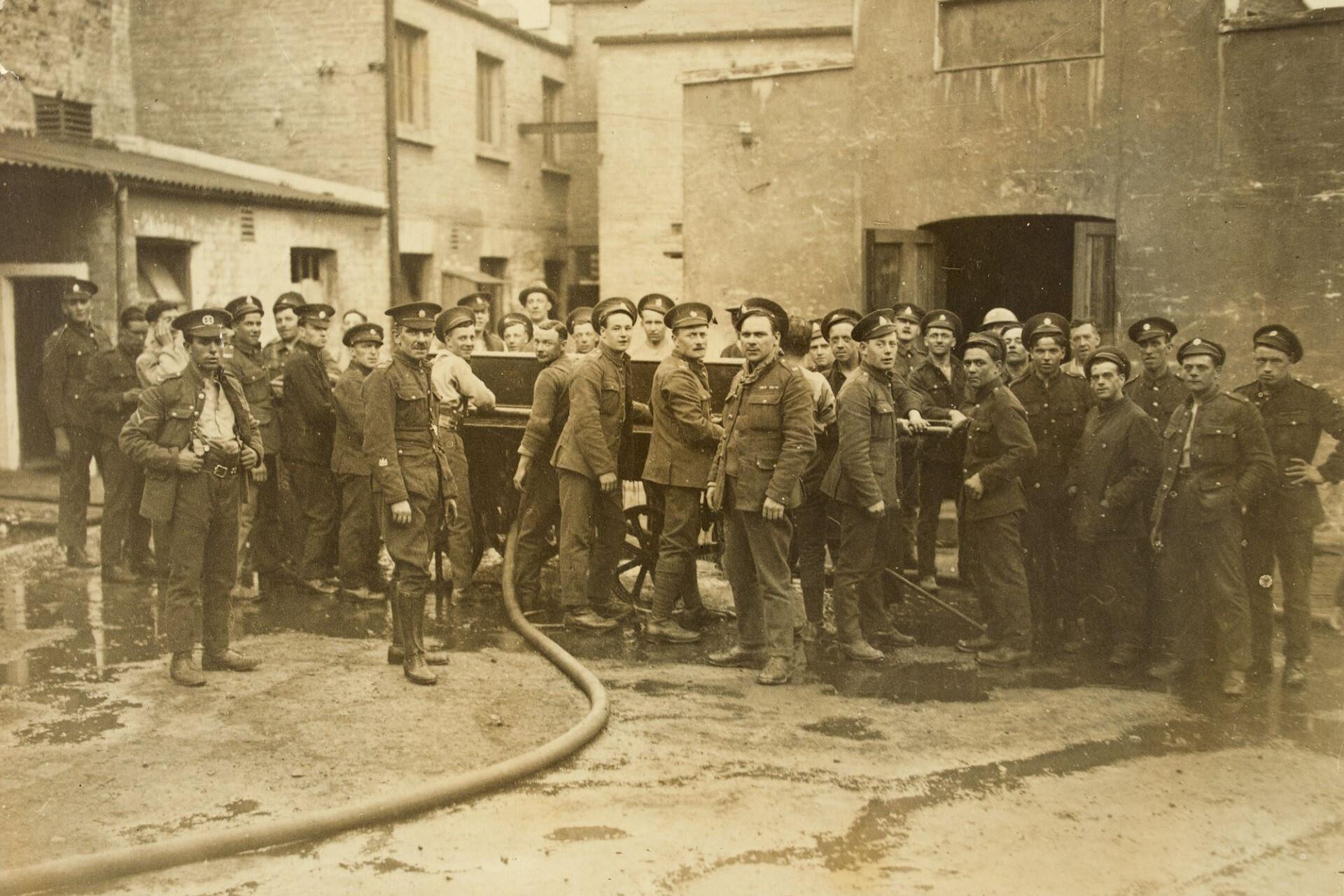 People in Parkgate Street, Dublin, 1029s, after a fire.