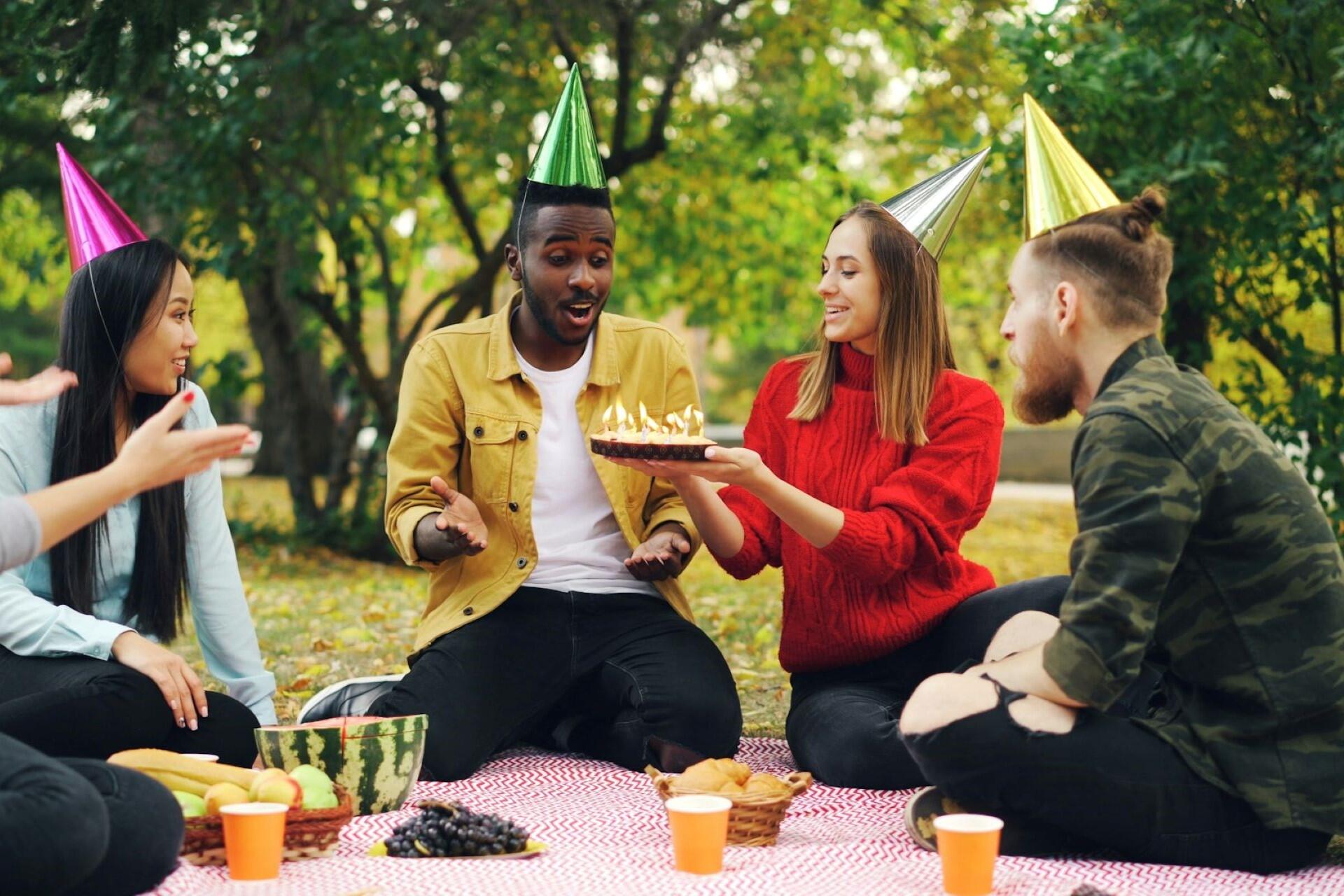 Birthday card and gift tag on a wooden surface