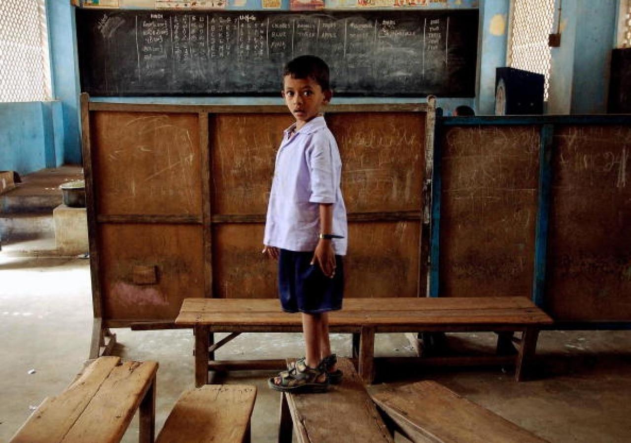 A child in empty classroom