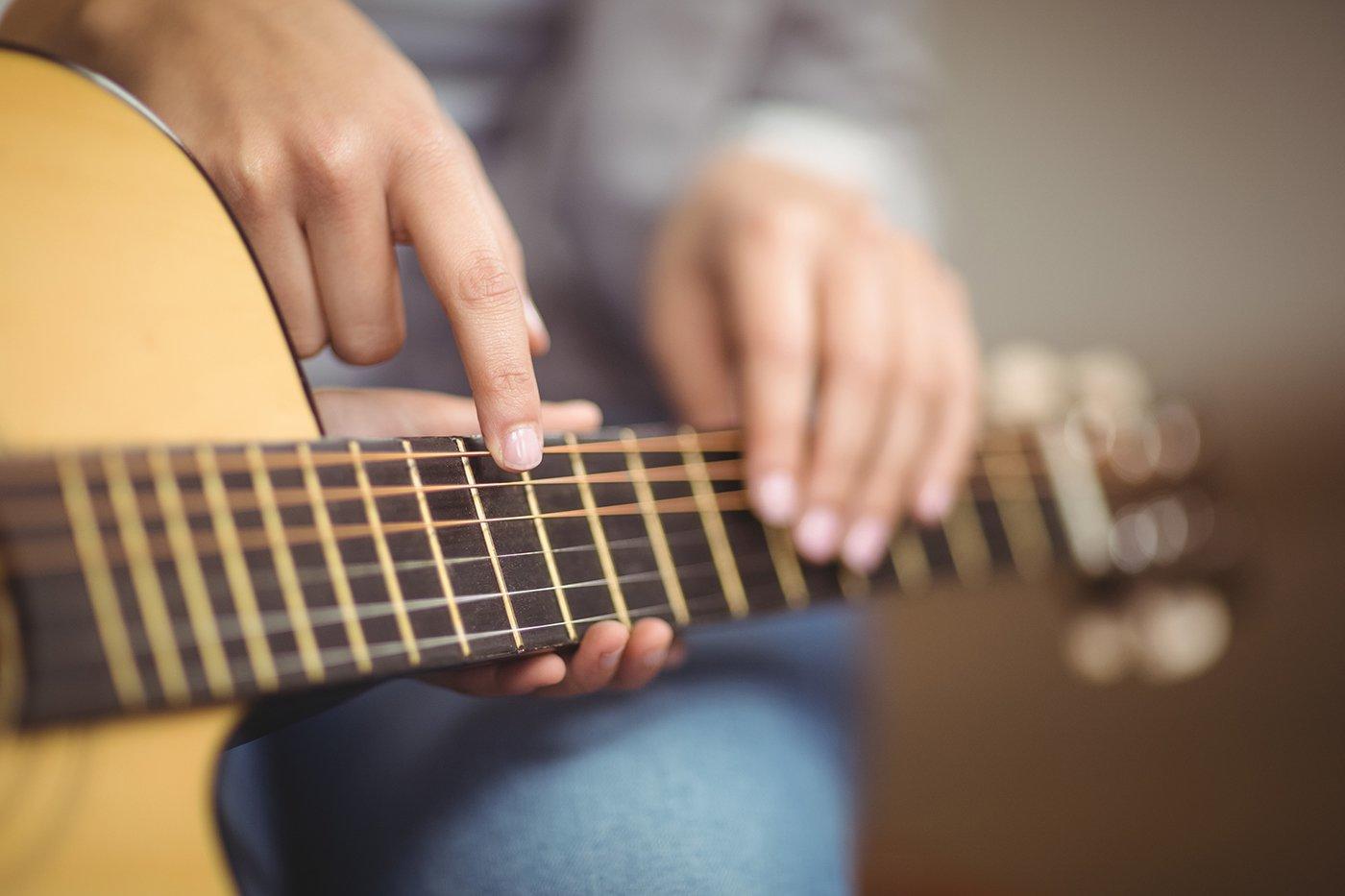 Playing guitar