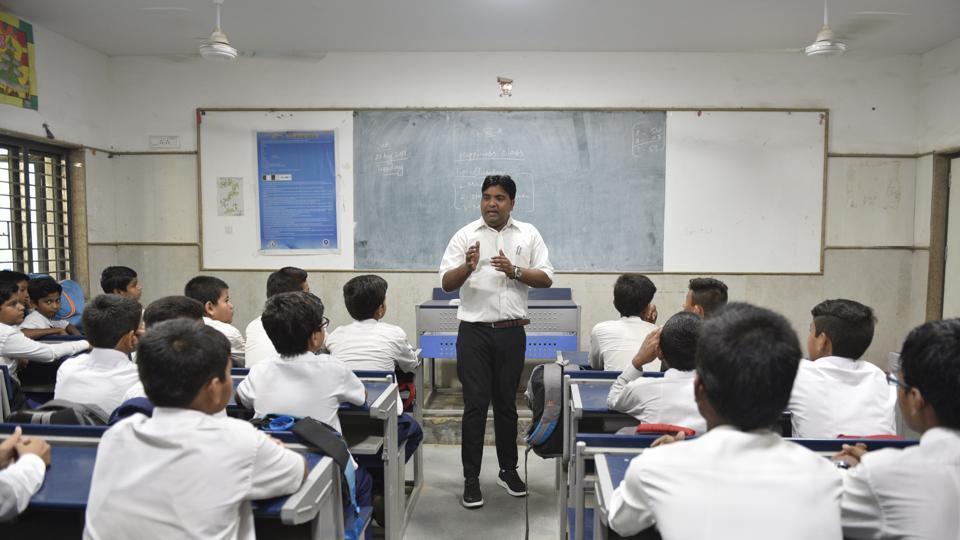 A teacher teaching in a classroom