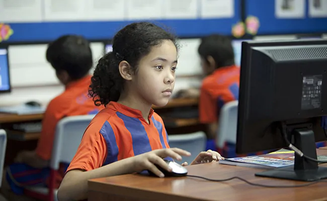Girl child seeking a lesson in class