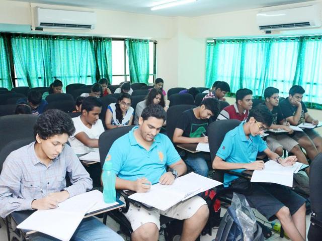 Students studying in a classroom.