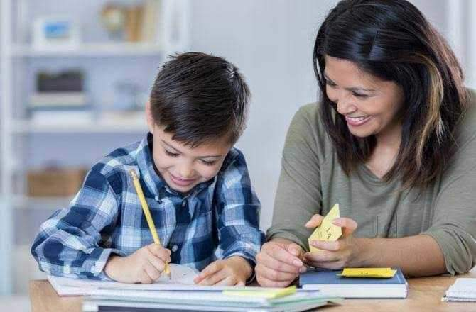 A tutor with her student