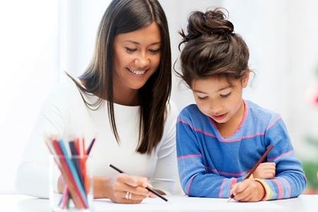 A teacher guiding her student