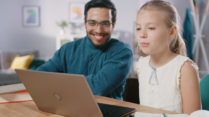 A teacher guiding his student