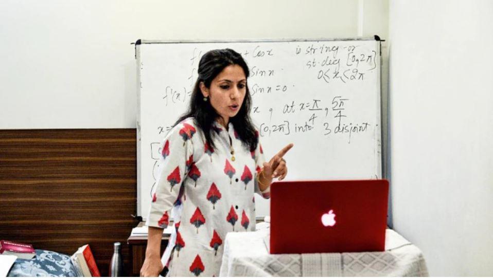 A teacher taking class online