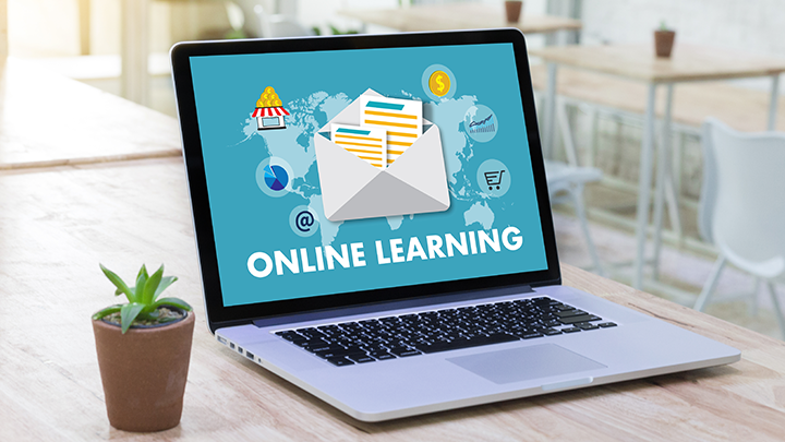 A laptop displaying online learning
