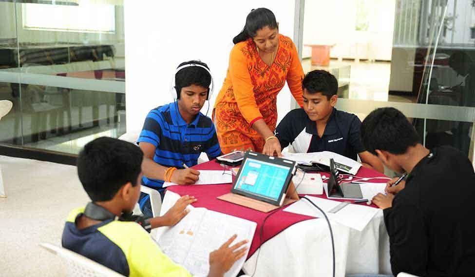 Teacher with a batch of students