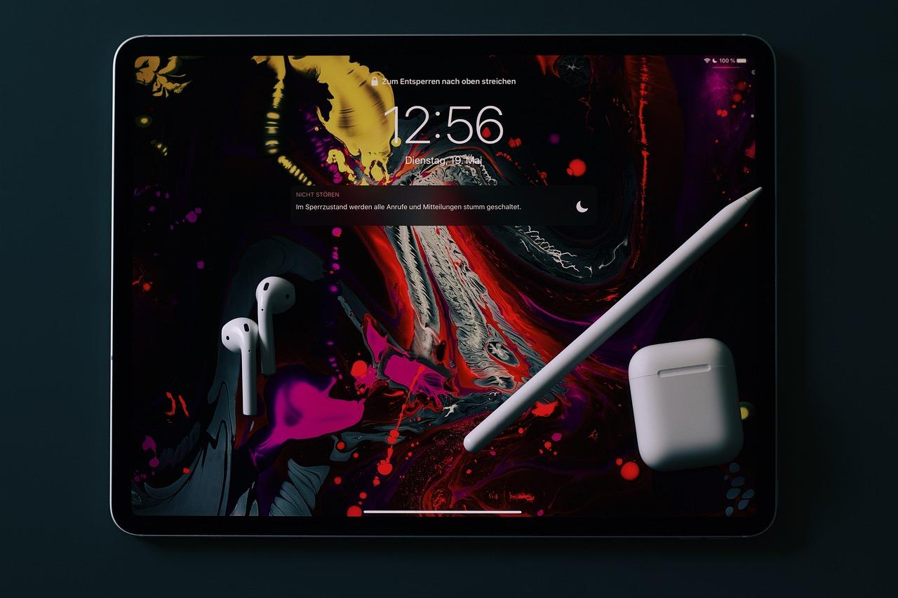 tablet, stylus, earphones