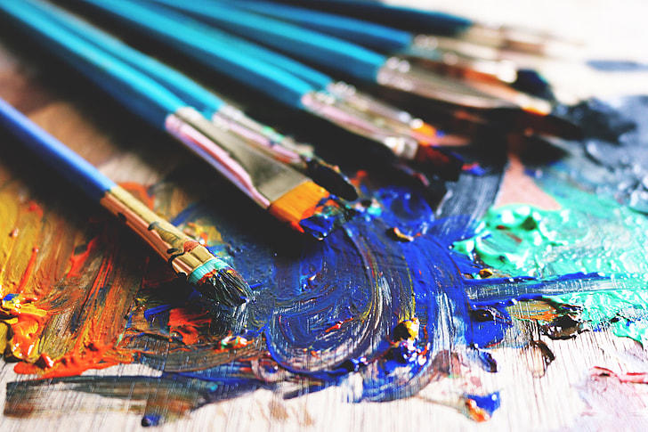 paint brushes and colors