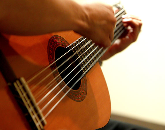 How to play guitar at home?