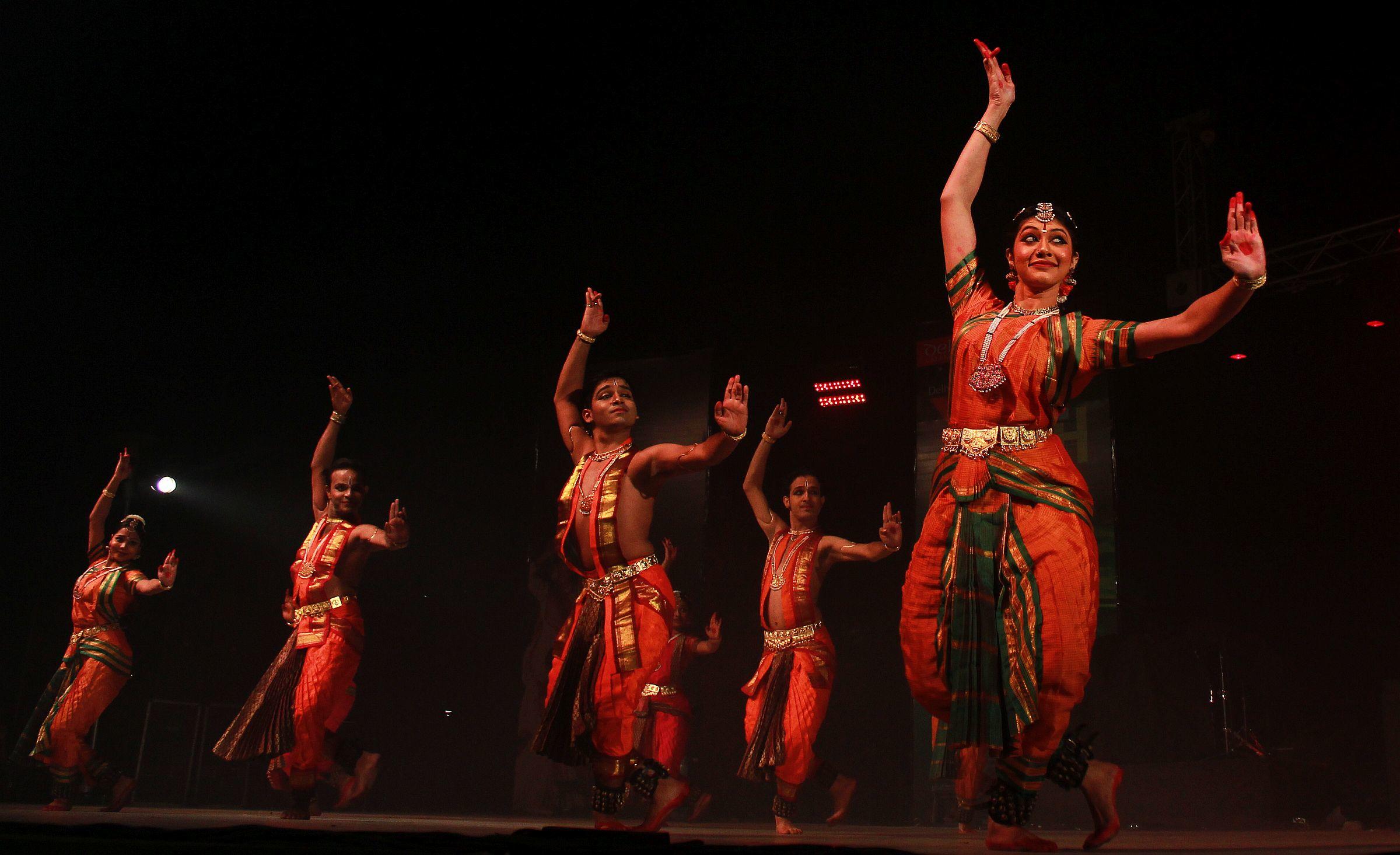 male and female dancers on stage