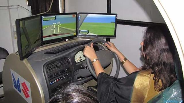 woman on a driving simulator