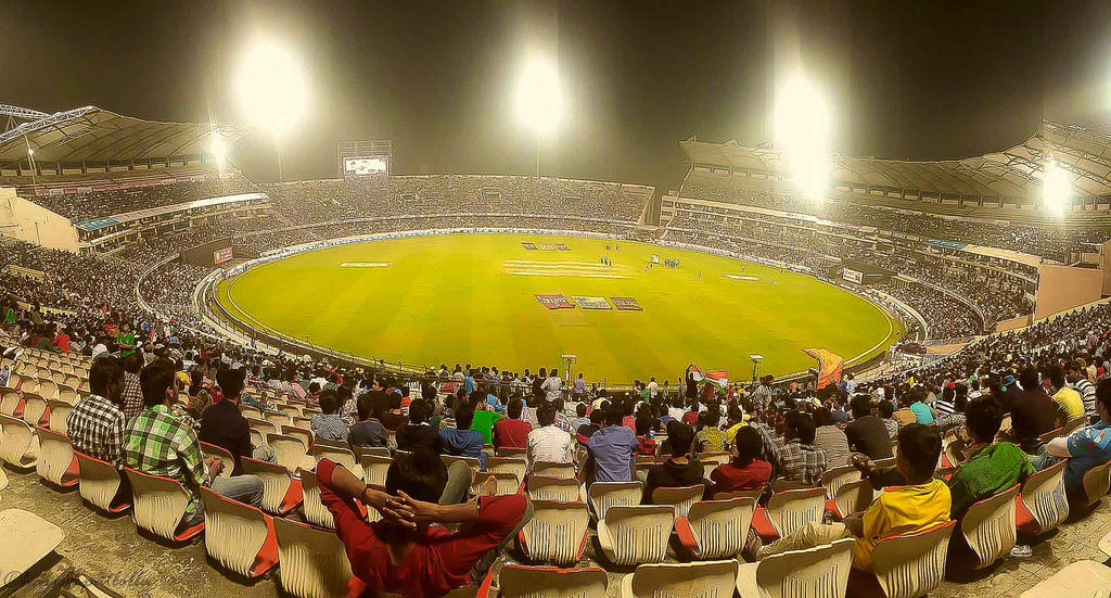 floodlight cricket stadium spectators