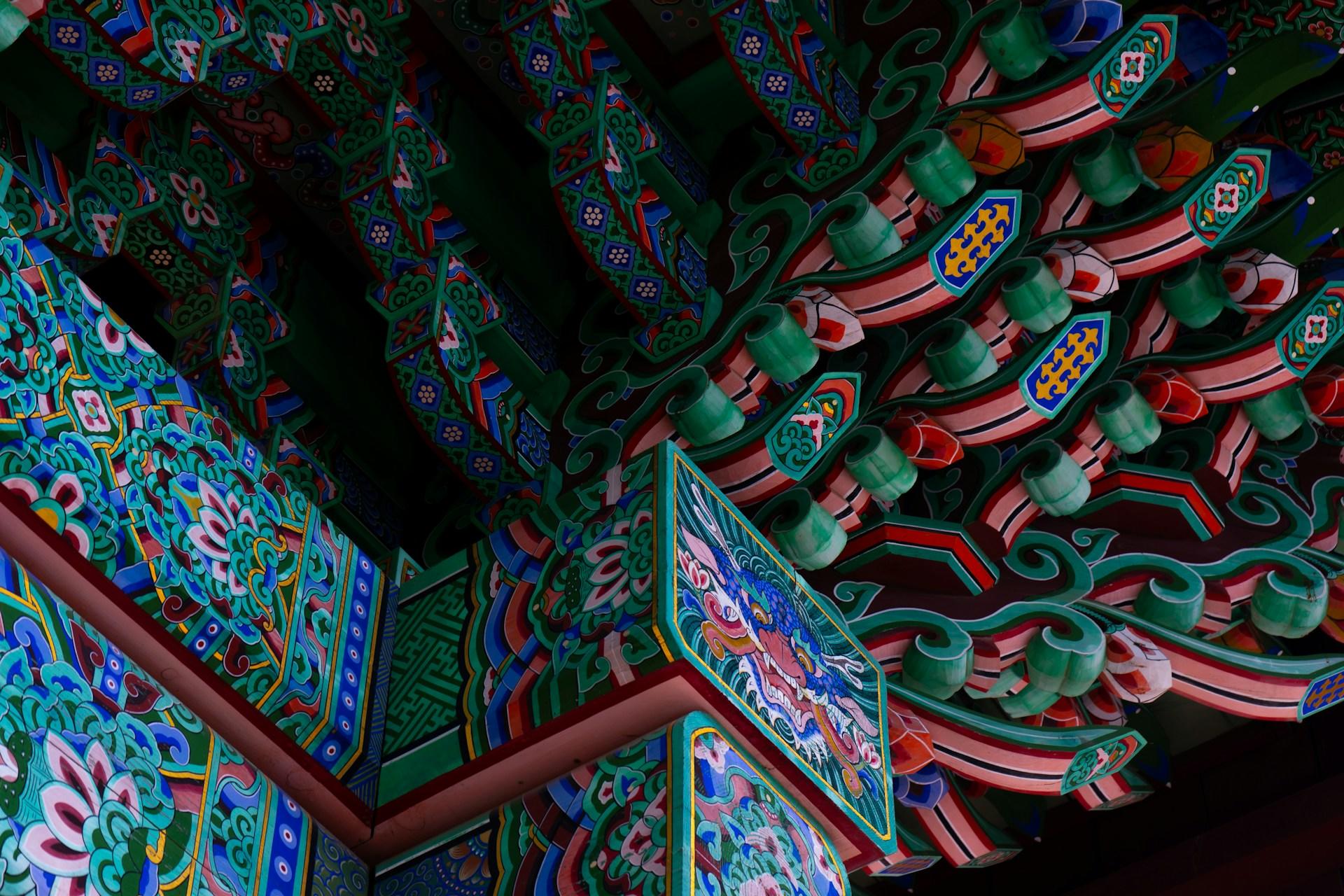 The intricately painted part of a Korean temple's eaves