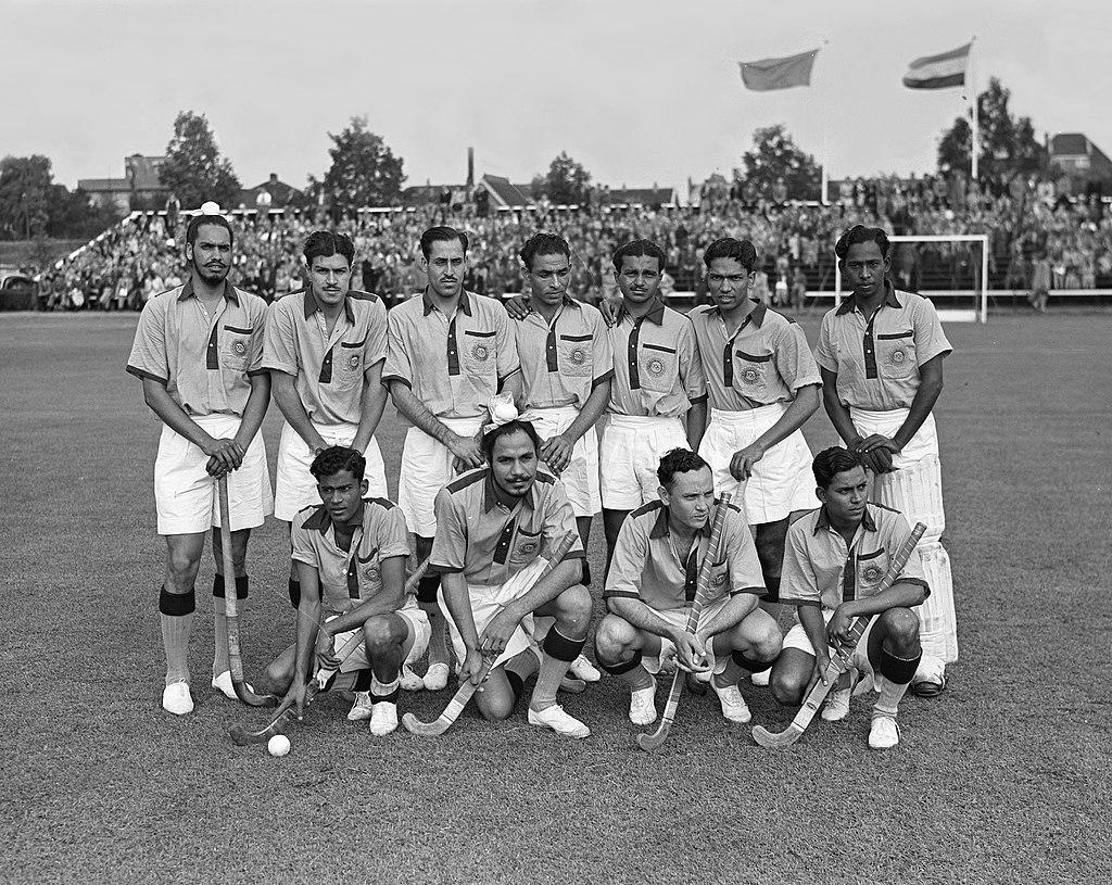 A black and white photo of the Men's Hockey Team in 1948 at the Olympics