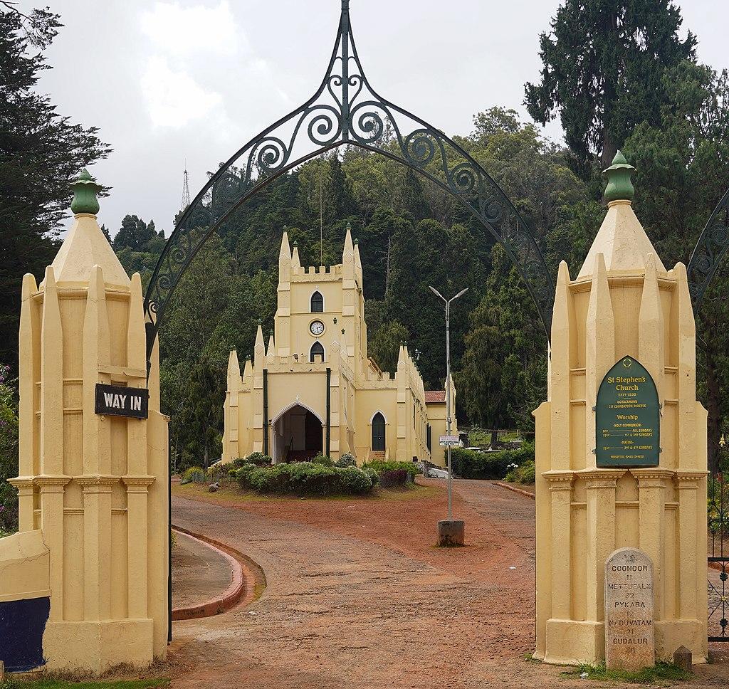Main entrance and front view of St. Stephen's Church. Old zero milestone and Info board visible.