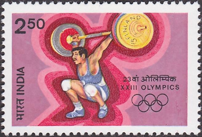 A scan of a 1984 Indian postage stamp with  an illustration of a weightlifter