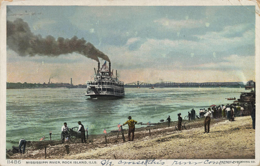 An old postcard c. 1900 showing a steamship carrying cargo down the Mississippi