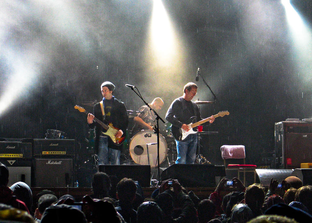 Eric Clapton and band live on stage