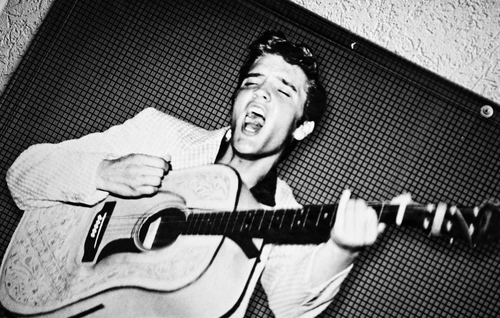 Remember that the ultimate girl magnet Elvis Presley played the guitar... Photo Visual Hunt.