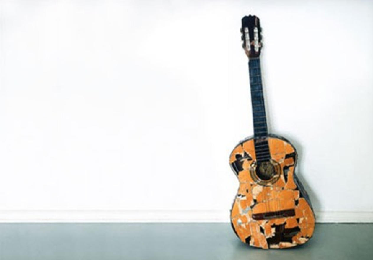 Learn to play guitar - preferably on a better instrument than this one!