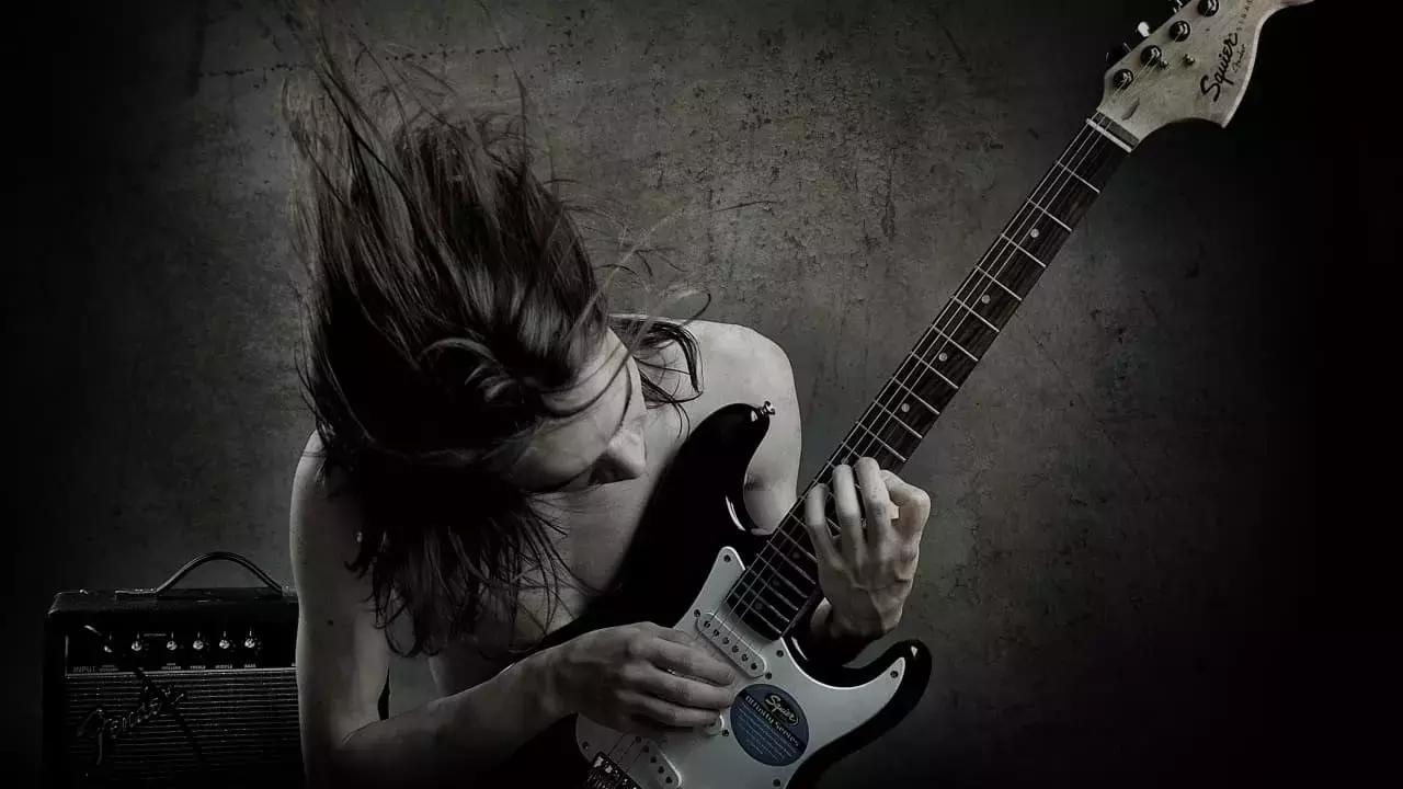 La chitarra ti aiuta a dimenticare il dolore.