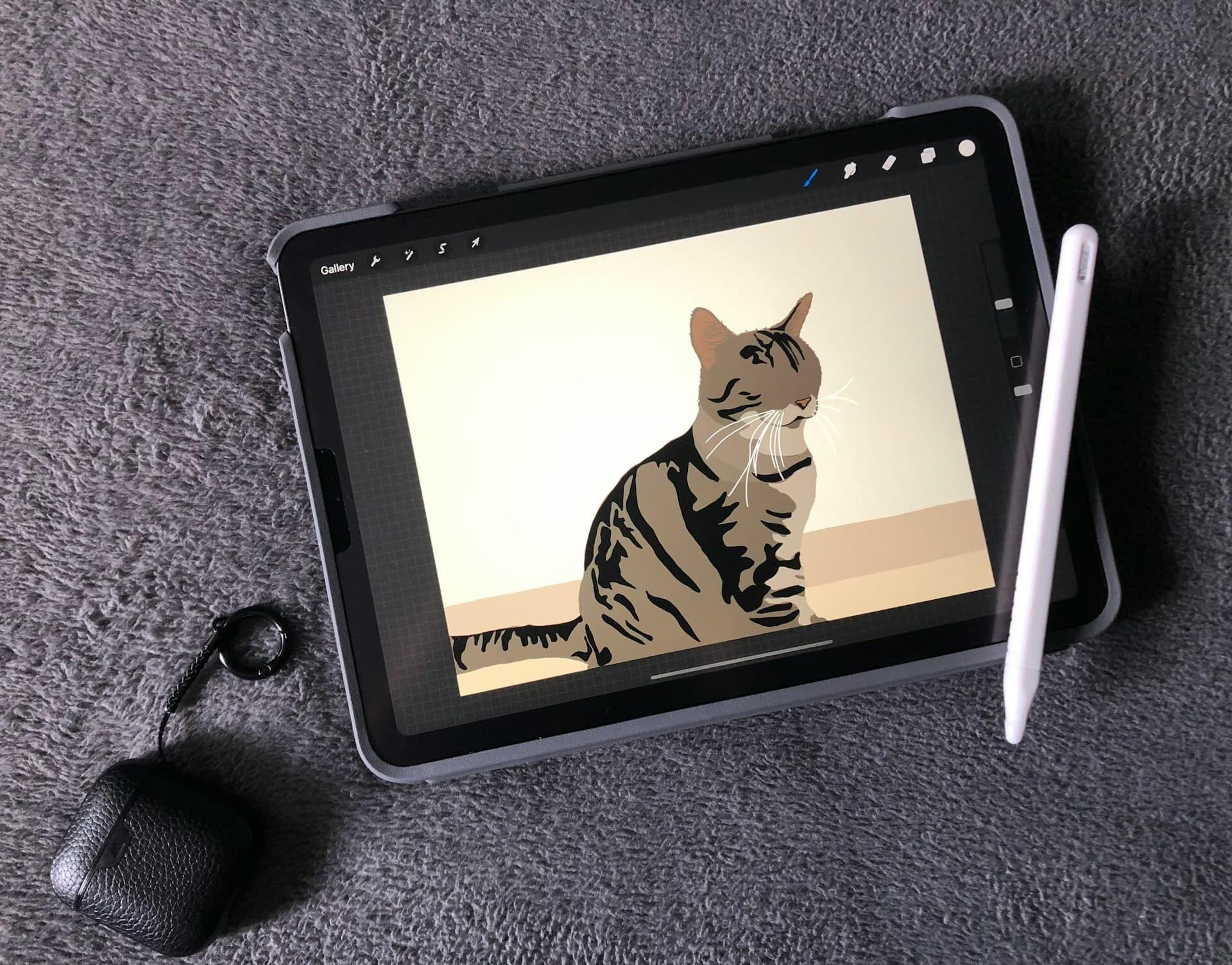 タブレットで猫のイラストを描く道具一式