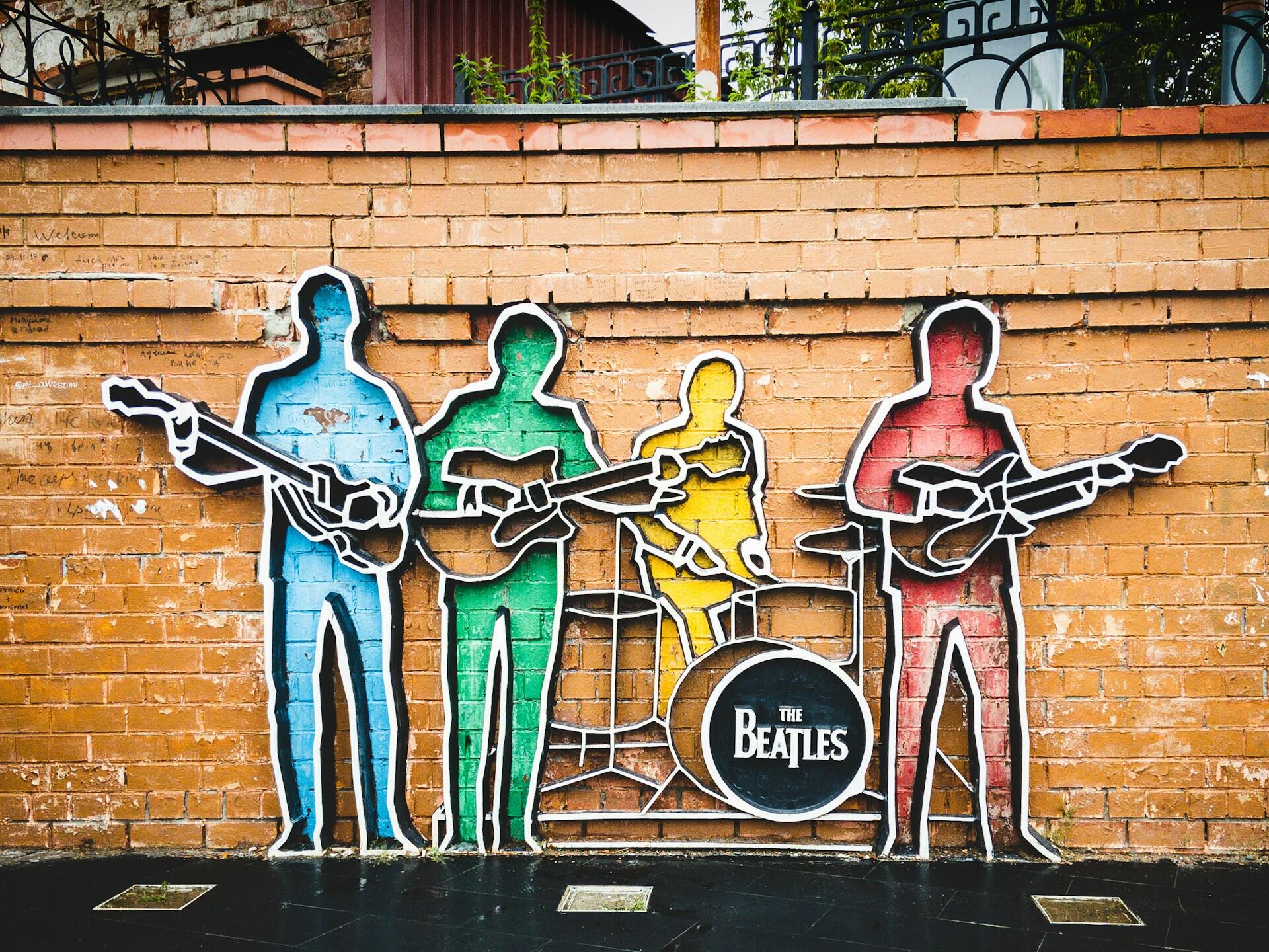 Beatles paveikslas ant sienos
