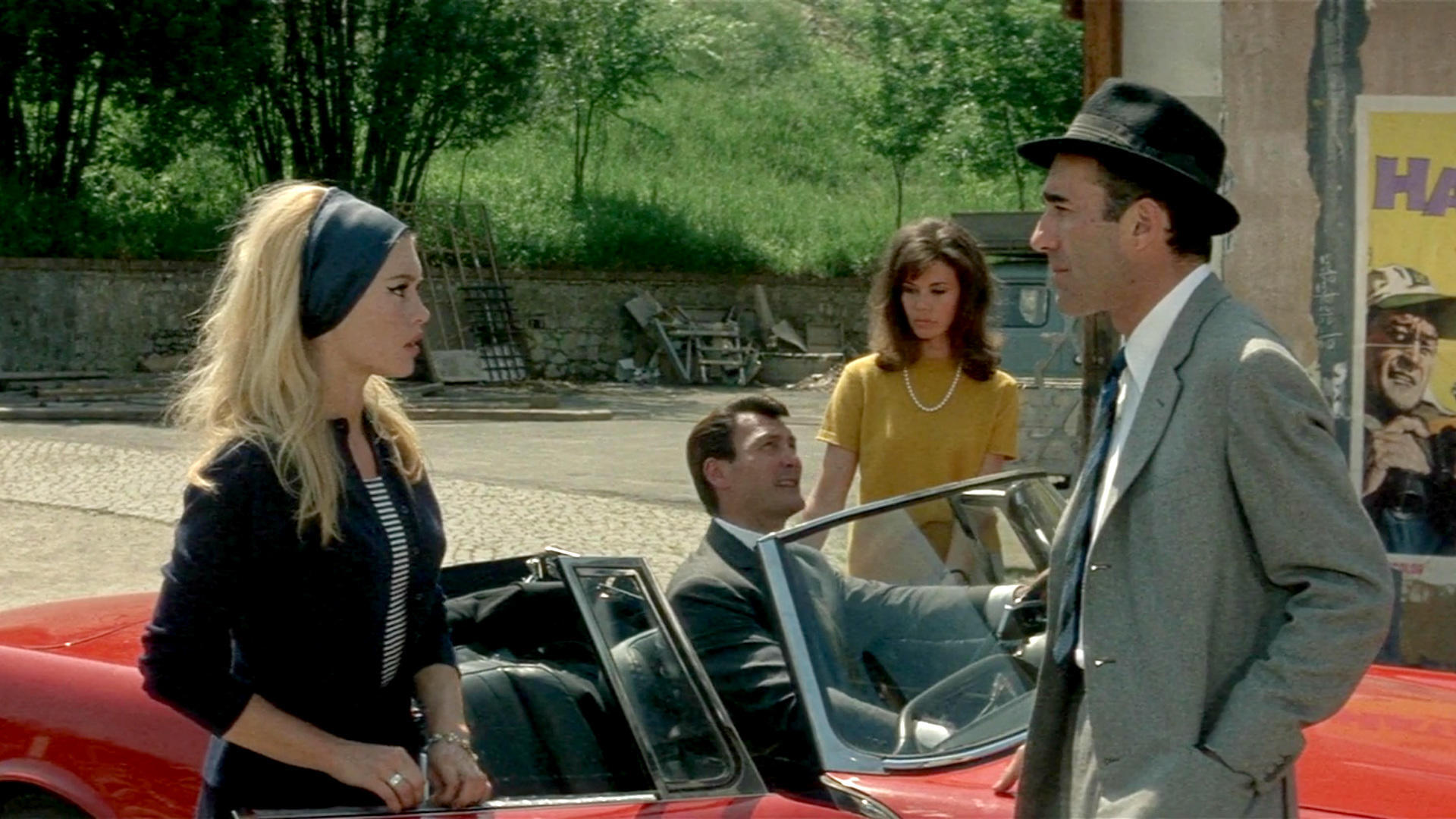 Michel Piccoli, Brigitte Bardot ir Jack Palance filmo Le Mépris scenoje.