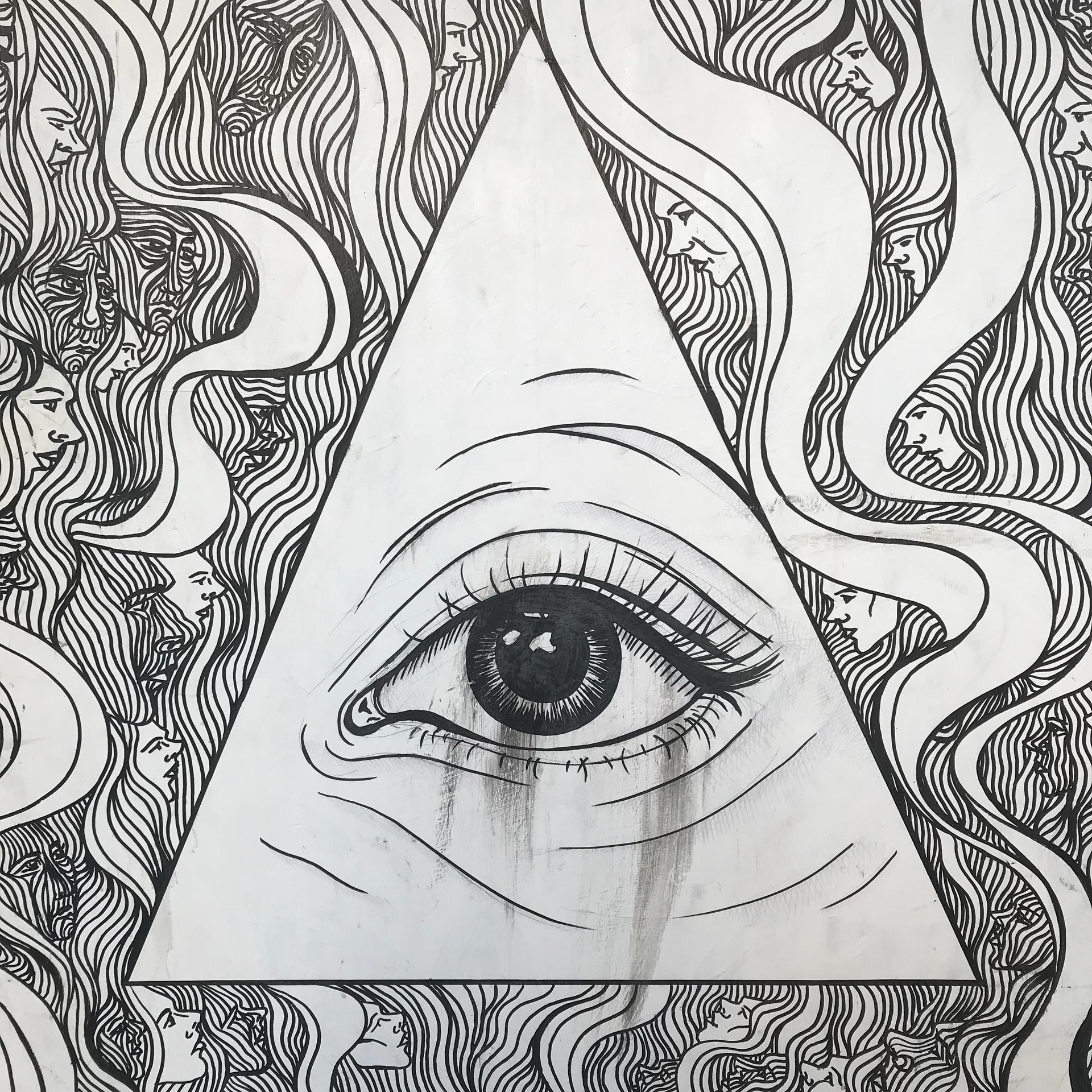 dessin d'un œil dans un triangle