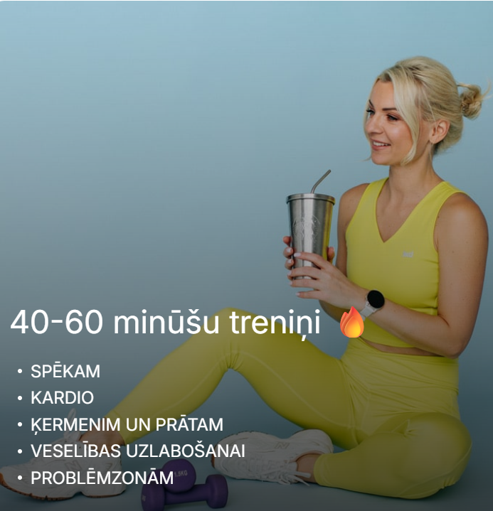 Sieviete košā dzeltenā sporta tērpā, kas sēž uz vingrošanas paklājiņa.