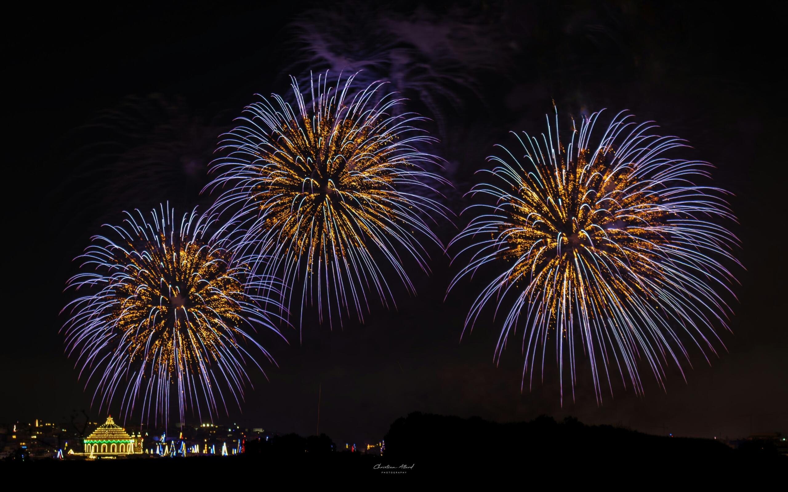 spectacular aerial fireworks display lighting up the night sky over Malta