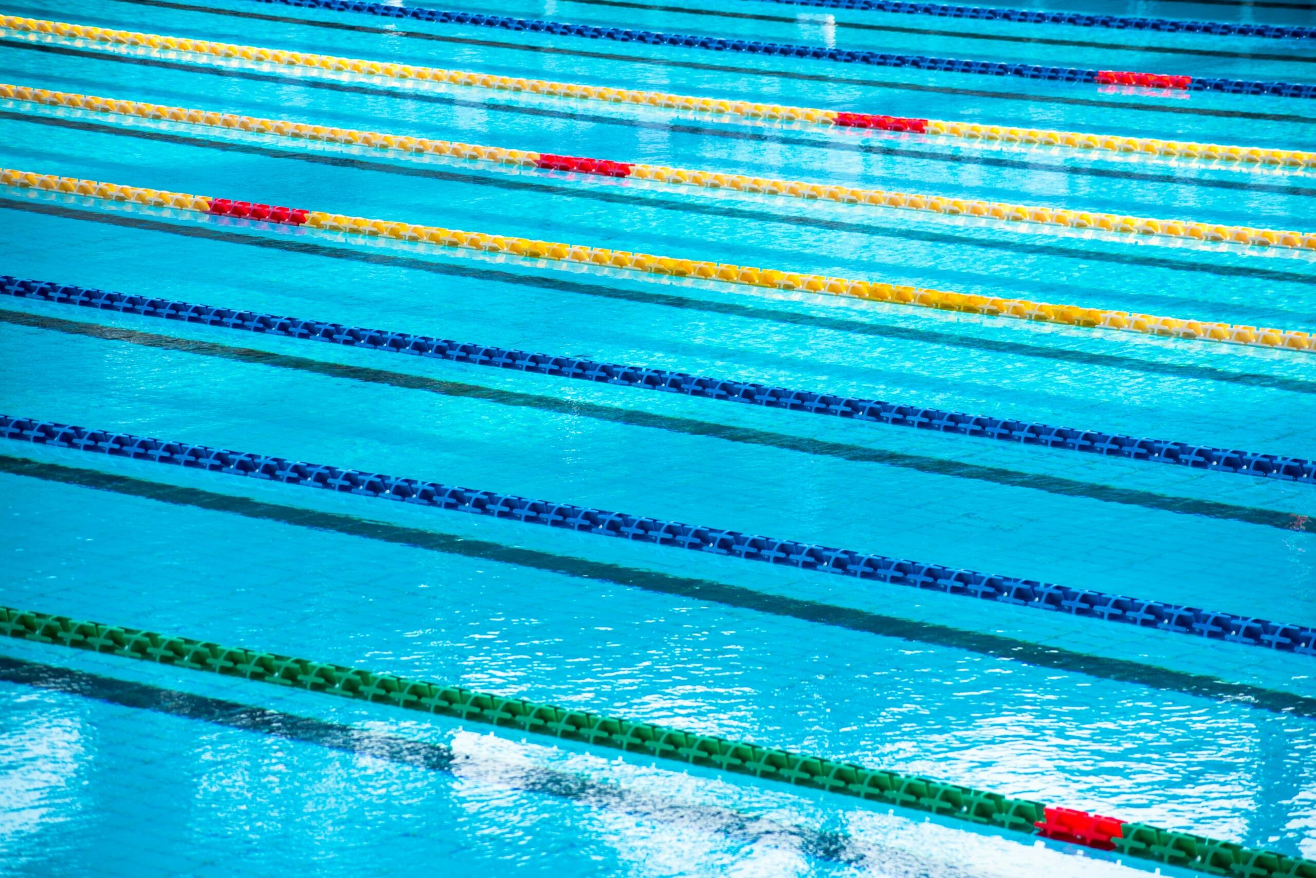 Aerial view of a swimming pool with lane ropes
