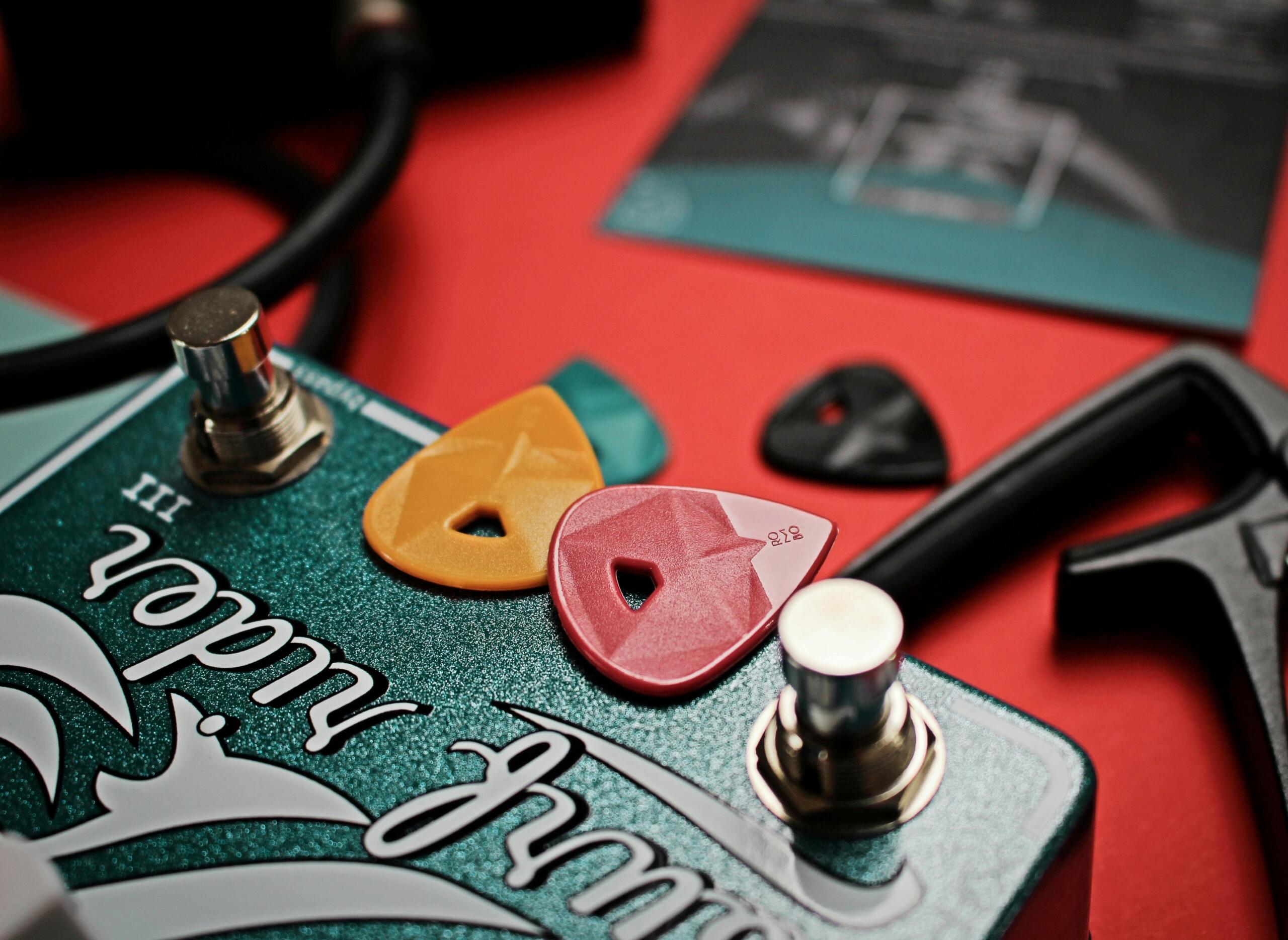 Guitar picks on a guitar pedal