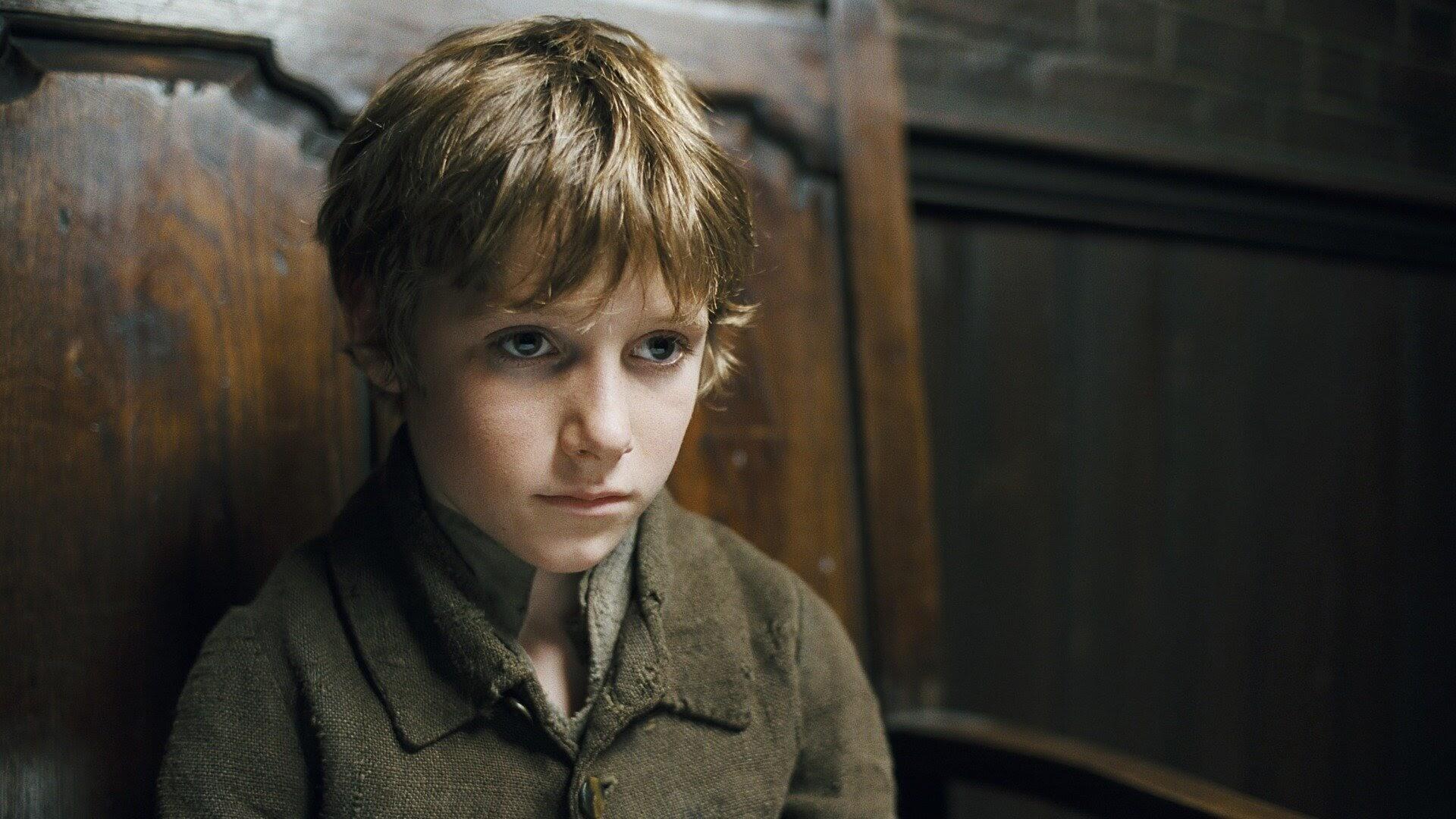 A child playing Oliver Twist