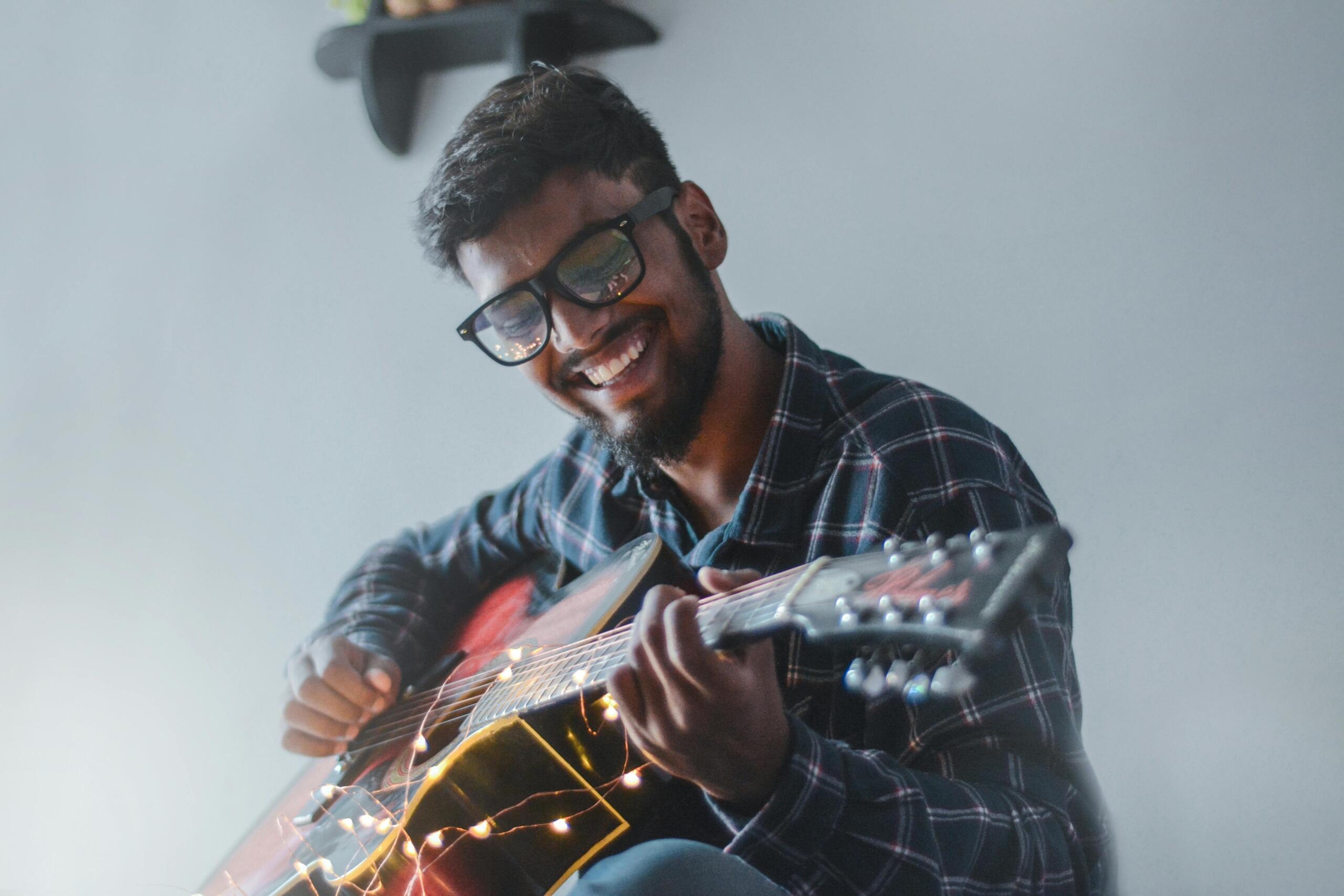 Man playing the guitar