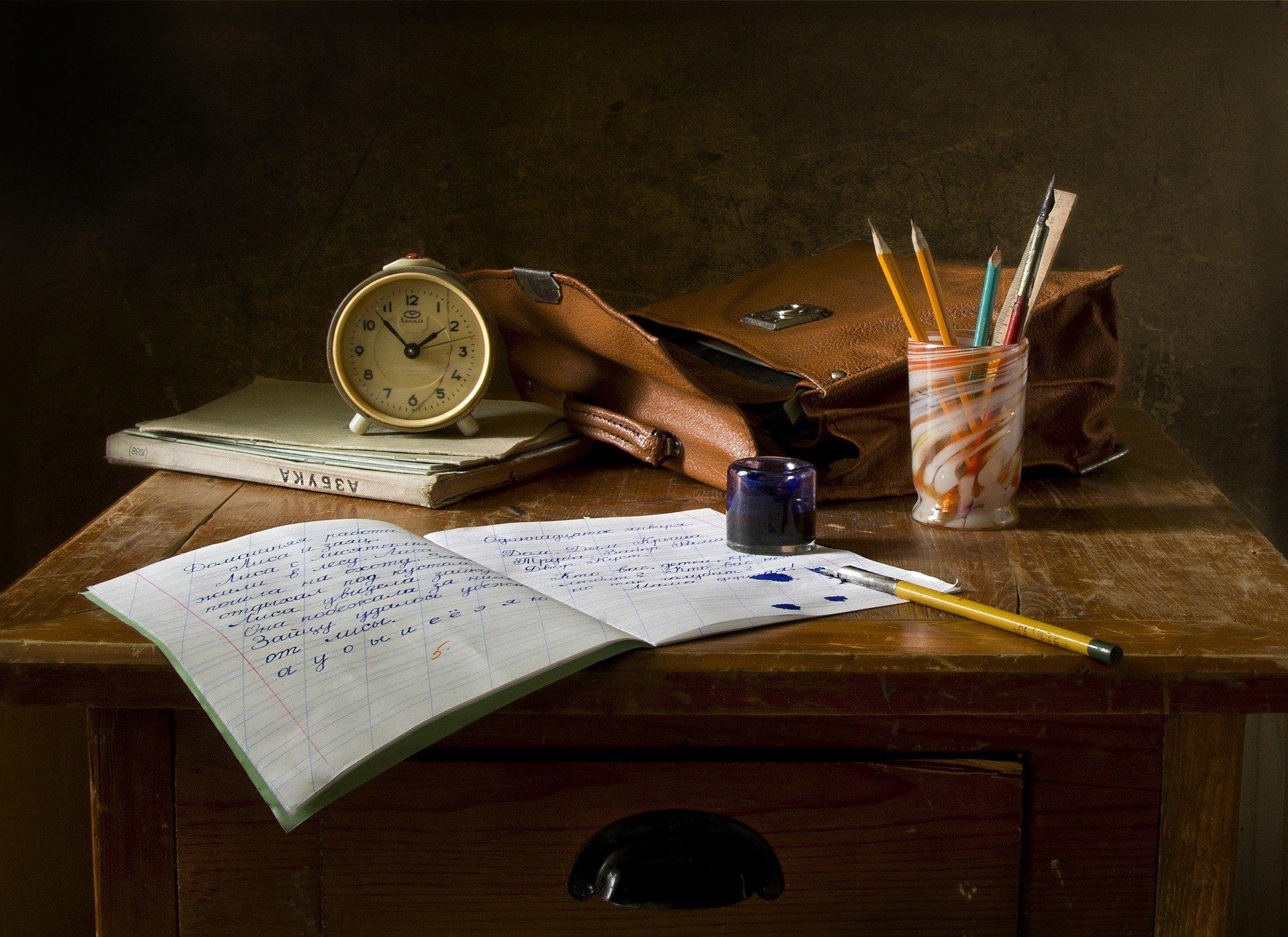 UPSR Practice Book and a clock